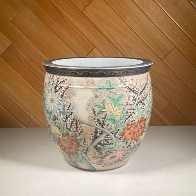 COLORFUL CHINESE CACHEPOT PLANTER | Colorfully decorated with birds amongst flora and fauna and gilt accents. Marked “Made in Macau” on...