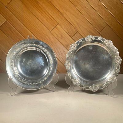 (2PC) STERLING SILVER PLATES | Including an International sterling plate (11 in., 12.1 ozt), and a Towle sterling plate (10 in., 9.1...