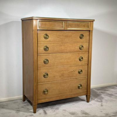 NATIONAL FURNITURE CO. TALL DRESSER | 20th century, light-colored wood; tall dresser with 5 full-width drawers and one split drawer at...