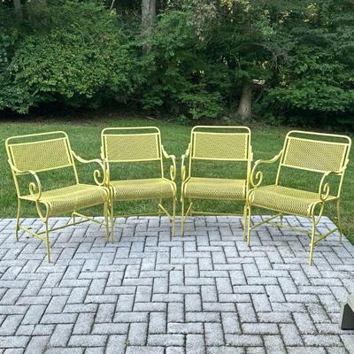 YELLOW AND BLACK PATIO SET | Includes 4 yellow aluminum chairs and large round fiberglass table with yellow aluminum legs connected by...