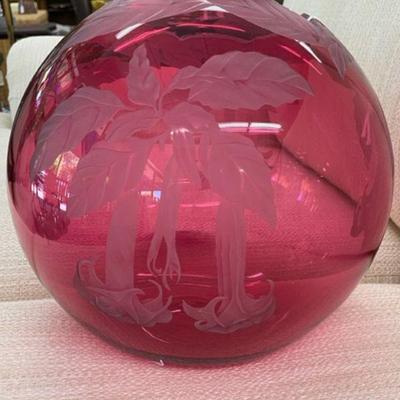 Signed cranberry vase is by Cynthia Myer in Mendocino