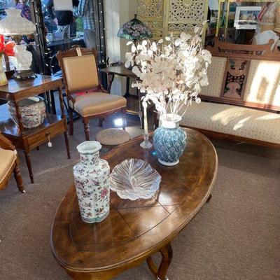 Chairs and loveseat, lovely vases, crystal from several countries. 