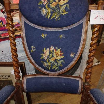 Antique rocking chair with hand stitched embroidery