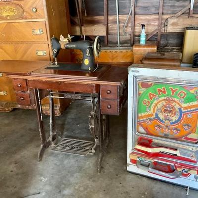 Singer sewing machine & cabinet. Sanyo pachinko game.