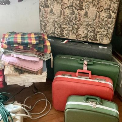 Vintage suitcases. Tablecloths, table runners, placemats