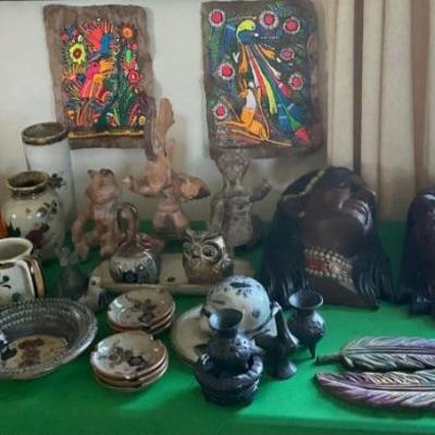 Various Mexican art pottery pieces.