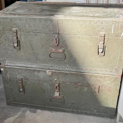 Two army trunks.