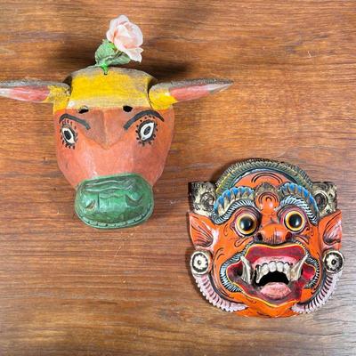 (2PC) PAIR OF FULL COLOR WOOD CARVED MASKS | Two handmade masks, including full-color dragon mask with gilt accents and full-color cow...