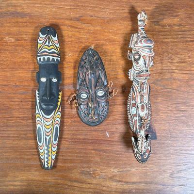 (3PC) MASKS & WOOD CARVINGS FROM PAPA NEW GUINEA | Three beautiful masks, including one hand painted and carved wall piece depicting...