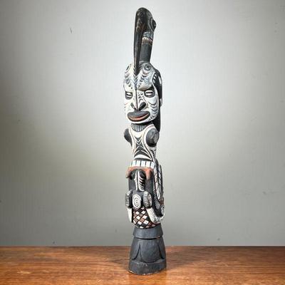 HAND CARVED & PAINTED AFRICAN STATUE | Carved wood statue depicting multiple animals and a human face with seashell eyes. - l. 4 x w. 3 x...