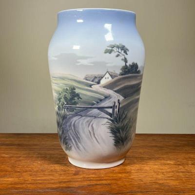 DANISH PAINTED VASE | Depicts countryside scene with river, stamped Royal Copenhagen. - h. 10 x dia. 6.5 in 