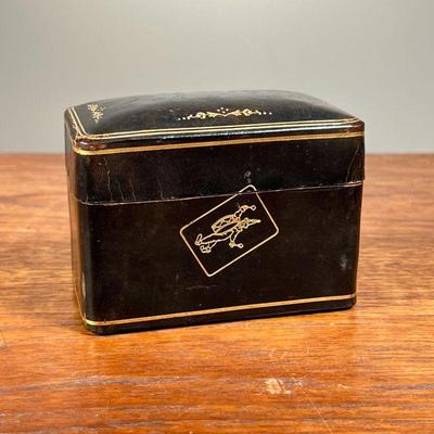 PLAYING CARDS CASE | Black case with gilt border and gilt images of playing cards. Includes two full decks inside. - l. 4 x w. 2.25 x h....