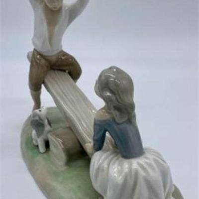 Lot 017   4 Bid(s)
Lladro #4867 Boy Girl Seesaw Figurine