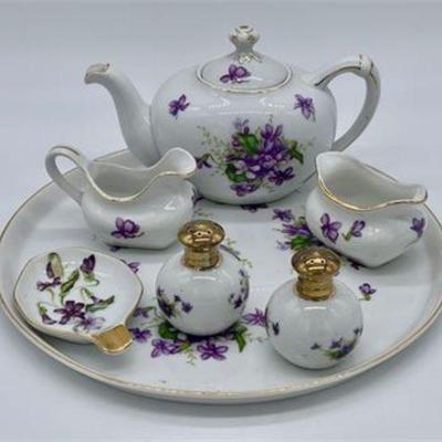 Lot 033   1 Bid(s)
Porcelain Tea Set with Tray