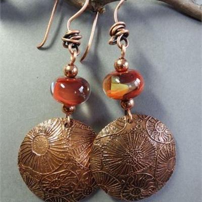Lot 229   15 Bid(s)
Artesian and Copper Disc Earrings (9)