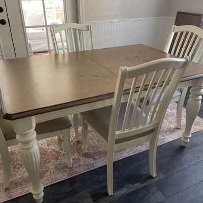 Hip dining table with extension 