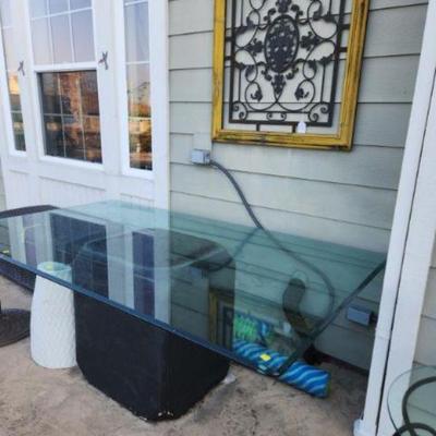 Glass table with solid base