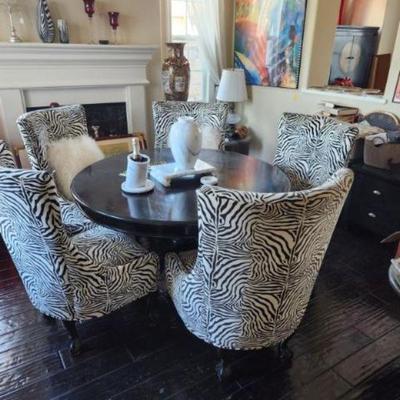 Z gallery table and zebra chairs 