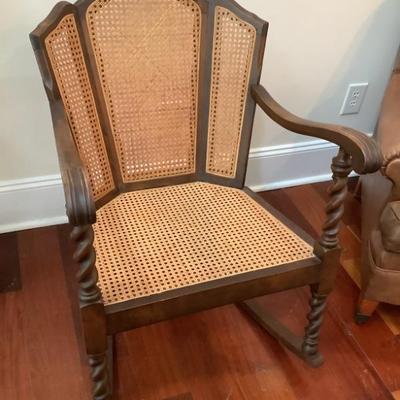$75 caned rocker with twisted legs 