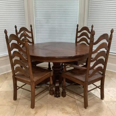 $389 round kitchen table with claw feet, leaf 24â€,   
 6 chairs, 2 are captains, 51â€ diameter 30â€H 