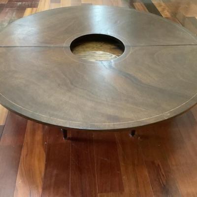 $199 1950's Mahogany Half moon to full moon coffee table with lazy susan middle 48" diameter, 24" diameter when half,...