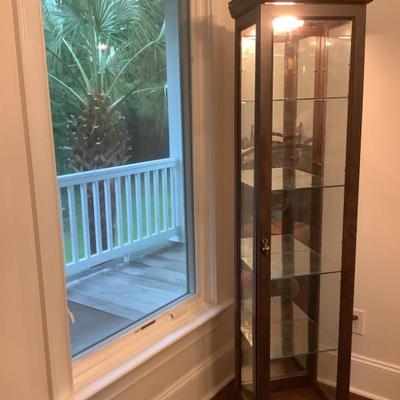 $45 display cabinet, light, mirrored back, 4 glass shelves, one wood on the bottom, 70â€H 17â€L 13â€depth