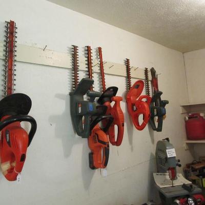 The tools!!! Heck yeah!  We have tons of power tools, yard tools, hand tools, antique tools, workbenches, ladders, toolboxes, storage...