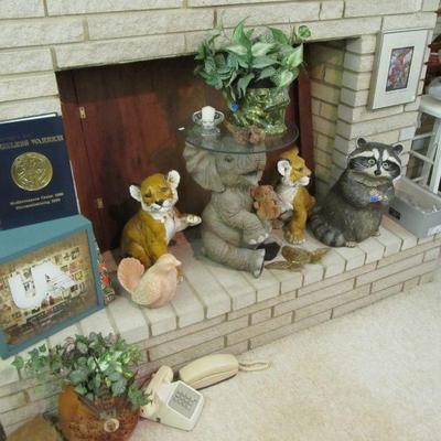 More fun animal sculptures and an elephant table. A United Artists 90th Anniversary DVD collector set in a collector metal box with 90...