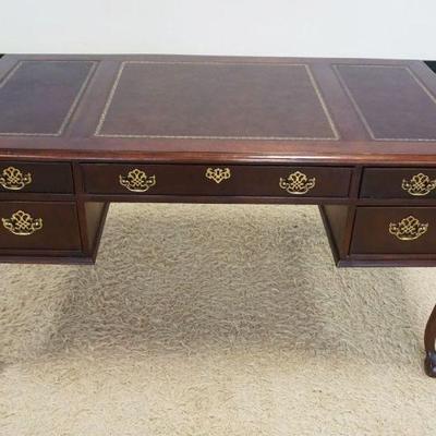 1211	MAHOGANY BALL & CLAW FOOT CHIPPENDALE STYLE DESK, 5 DRAWER W/INSET LEATHER TOP, APPROXIMATELY 56 IN X 28 IN X 31 IN HIGH
