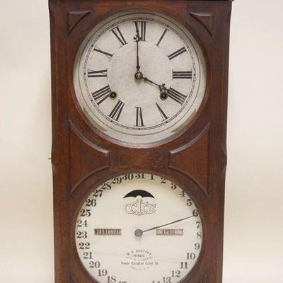 1150	ITHICA CALENDAR CLOCK IN WALNUT CASE, CLOCK FACE & BACK REPLACED, APPROXIMATELY 5 IN X 12 IN X 25 IN
