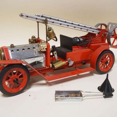 1297	MAMOD TOY STEAM ENGINE FIRE TRUCK, APPROXIMATELY 6 IN X 20 IN X 8 IN
