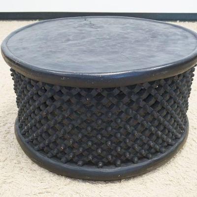 1252	BAMILEVE AFRICAN CARVED LATTICE WORK WOOD ROUND TABLE, APPROXIMATELY 34 IN X 19 IN HIGH
