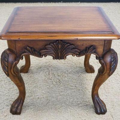 1208	ORNATE CARVED PAW FOOT OCCASSIONAL STAND IN WALNUT FINISH, APPROXIMATELY 28 IN X 23 IN X 26 IN HIGH
