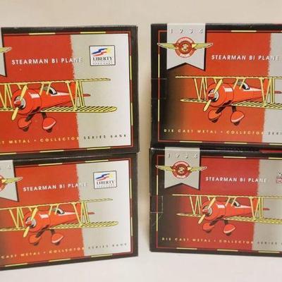 1319	LOT OF 4 BOXED LIBERTY DIE CAST METAL AIRPLANE BANKS
