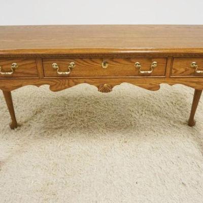 1166	PENNSYLVANIA HOUSE SOLID OAK SOFA TABLE, 3 DRAWER WQUEEN ANNE LEGS & SHELL CARVING, APPROXIMATELY 52 IN X 16 IN X 27 IN HIGH
