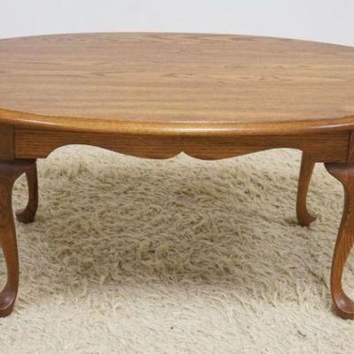 1168	PENNSYLVANIA HOUSE SOLID OAK OVAL COFFEE TABLE, APPROXIMATELY 42 IN X 27 IN X 17 IN HIGH
