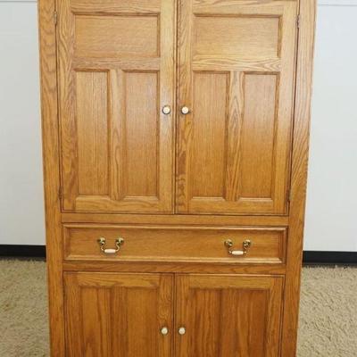 1173	PENNSYLVANIA HOUSE SOLID OAK WARDROBE, 4 DOOR, ONE DRAWER W/PANELED SIDES, APPROXIMATELY 44 IN X 22 IN X 72 IN HIGH
