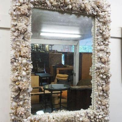 1184	ORNATE CONTEMPORARY SEASHELL MIRROR, SOME LOSS TO FRAME, APPROXIMATELY 32 IN X 41 IN
