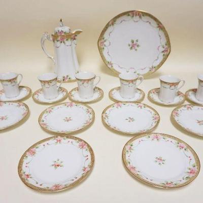 1276	HAND PAINTED NIPPON CHOCOLATE SET W/6-6 1/4 IN SERVING DISHES
