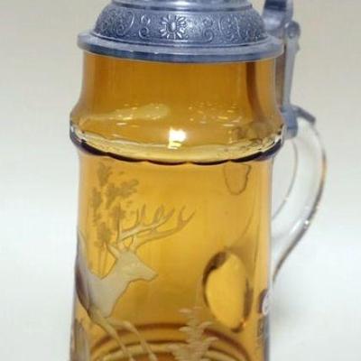 1055	BAVARIAN CRYSTAL AMBER ETCHED GLASS STEIN JEWELED PEWTER LID, APPROXIMATELY 9 IN H. SIGNED & NUMBERED
