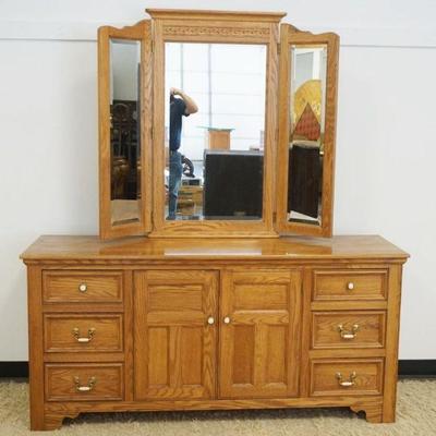 1171	PENNSYLVANIA HOUSE SOLID OAK LOW DRESSER W/TRIPLE BEVELED EDGED MIRROR TOP, APPROXIMATELY 68 IN X 19 IN X 76 IN HIGH
