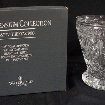 1039	WATERFORD CRYSTAL MILLENNIUM CHAMPAGNE BUCKET, APPROXIMATELY 9 3/4 IN X 10 3/4 IN H
