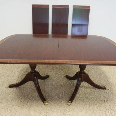 1193	HENKEL HARRIS MAHOGANY BANDED DINING ROOM TABLE, APPROXIMATELY 46 IN X 72 IN X 30 IN HIGH W/3 LEAVES APPROXIMATELY 16 IN EACH
