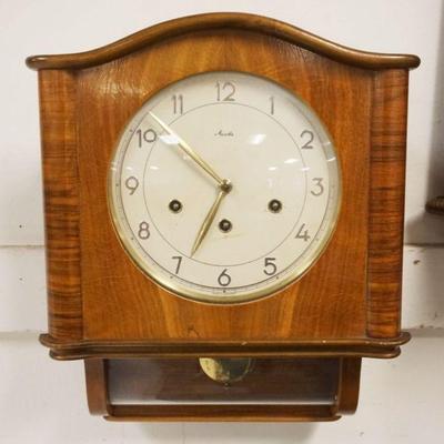 1161	GERMAN ART DECO MAUTHE WALL CLOCK W/CURVED GLASS BOTTOM, APPROXIMATELY 13 IN X 5 IN X 15 IN HIGH
