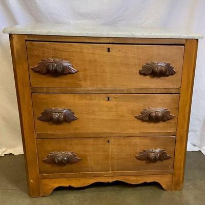 JIFI211 Antique Small Basin Dresser	Comes with 3 drawers with pull grip handles. Has a removable marble top. This dresser does teeter a...