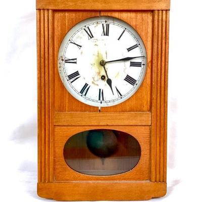 DONLAR931 Antique Art Deco Wall Clock	Wooden,time only clock with key. Â Winds with key.
