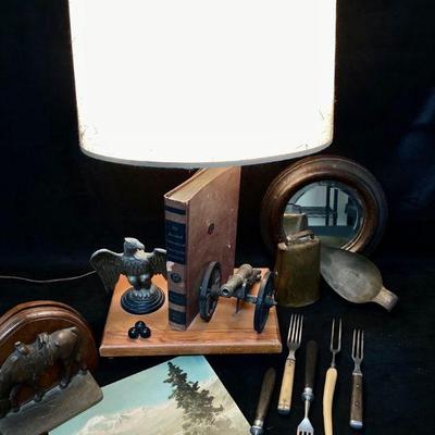 JIFI922 Antique & Vintage Rustic Decor	Table lamp with cannon, cannonballs, Eagle, and book - works. Â 5 civil war utensils. Â 1 set...