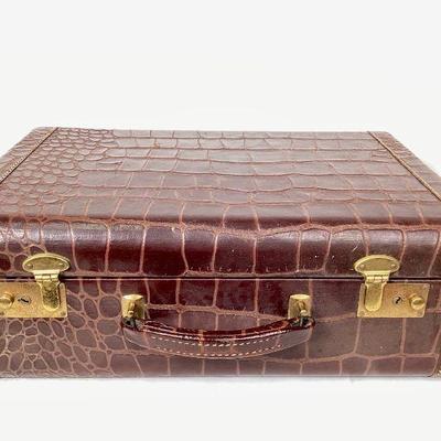 JIFI918 Vintage Crocodile Leather Travel Suitcase	Dark brown leather with burgandy satin lined interior. Â Monogrammed C.R. Below handle,...