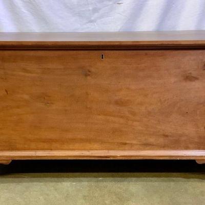 JIFI200 1830â€™s Cherry Blanket Chest	A beautiful cherry wood blanket chest with a key. Inside the chest has a smaller compartment that...