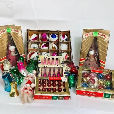 JIFI709 Vintage Christmas Tree Ornaments	Lot includes: Â 2 Angels, 2 Â boxes of Teardrop Icicles, Â Vintage Poland Mica Glitter and...